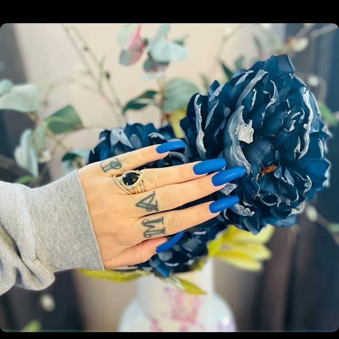 Vibrant blue nail enhancements