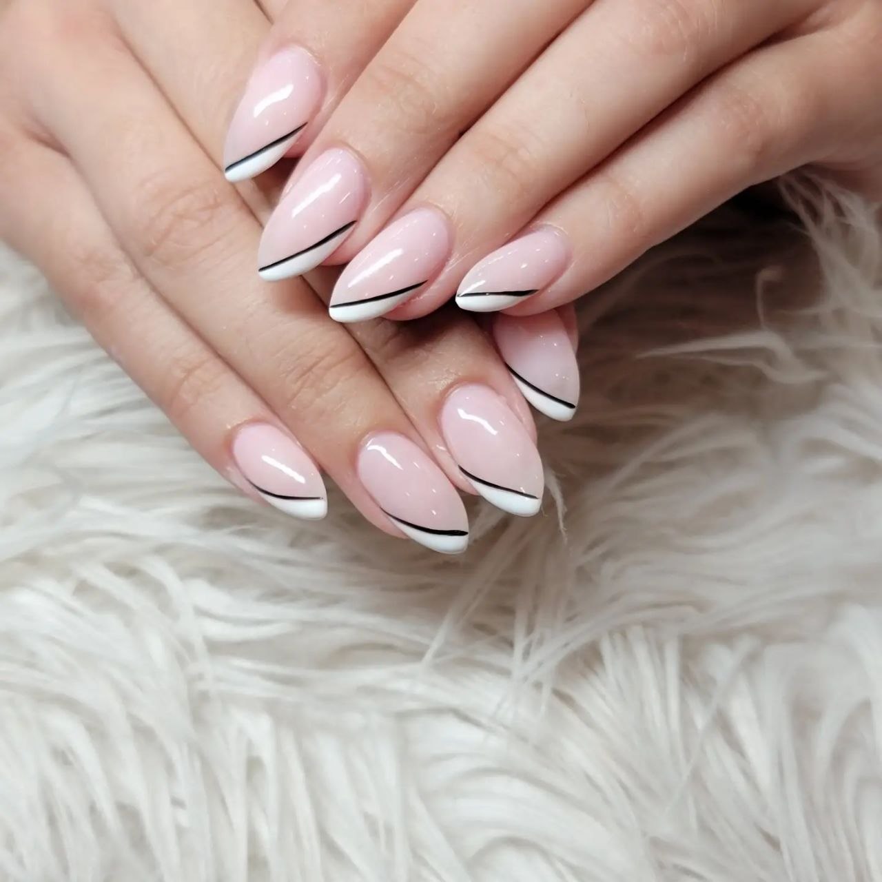 Soft pink nail art with elegant French tips